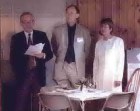 Speech by Dominick Harrod, with John and Ang Algar nearby 
(Photo c.John Peake 2004)